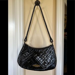 Elliott Luca patent black leather handbag.